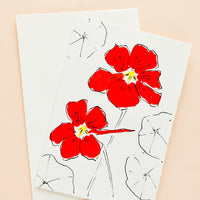 Nasturtium: A white greeting card with a hand painted illustration of red nasturnium.