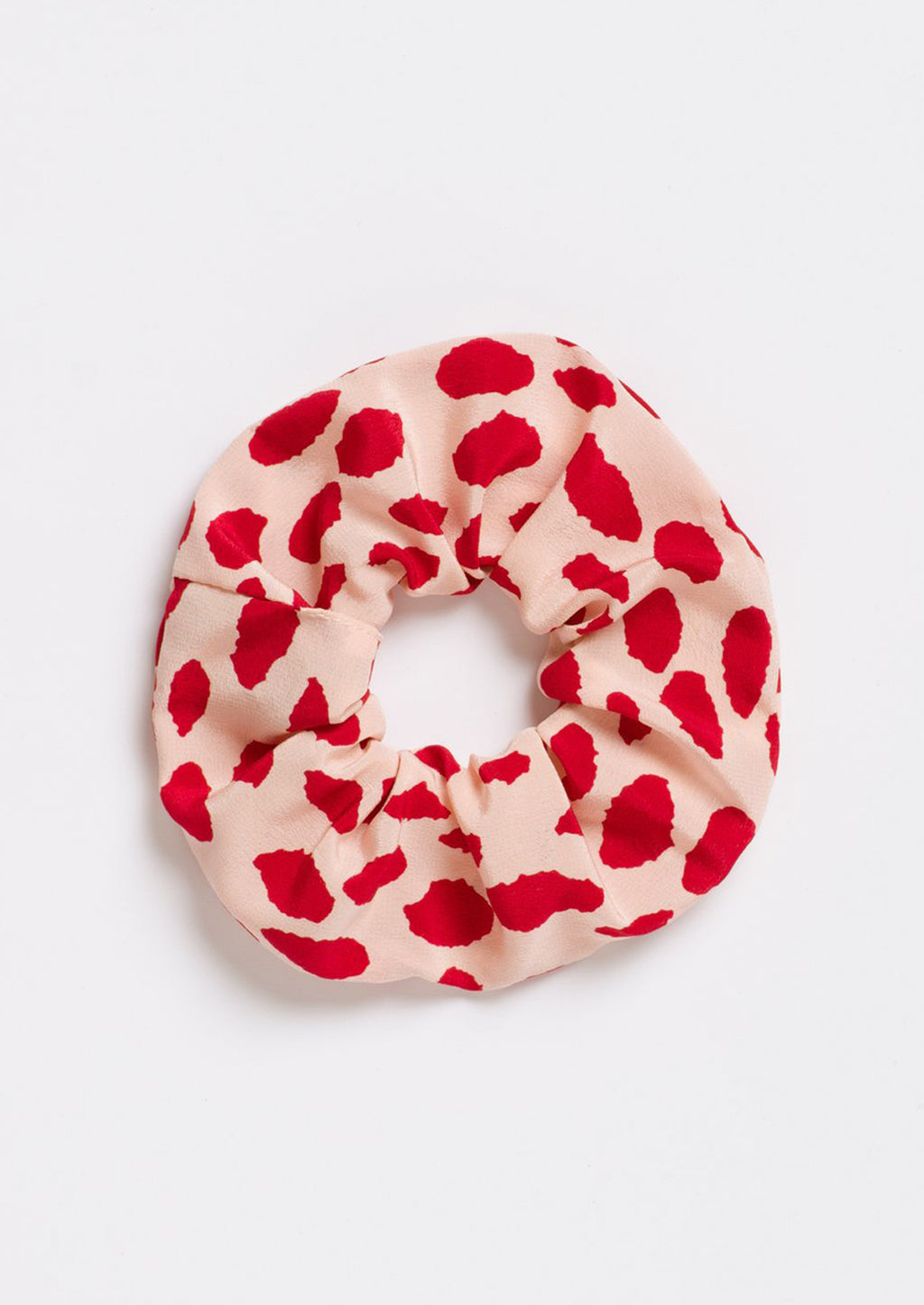 Lipstick Spots: A silk scrunchie in beige with red spots.