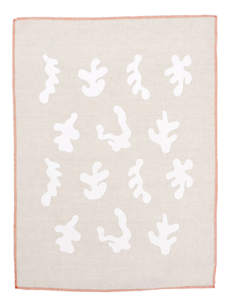 Natural / White: Beige linen towel with white squiggle shape pattern and orange trim.