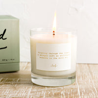 Wild Air: A jar candle with haiku print label.