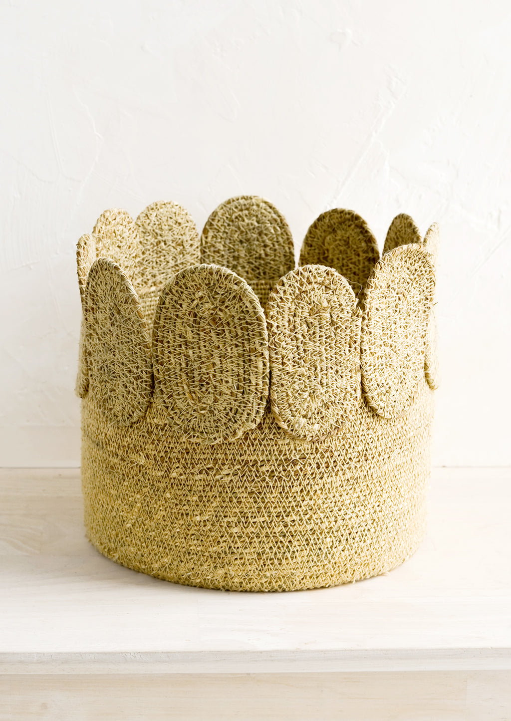 Tall: A circular seagrass storage basket.