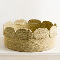 Wide: A shallow circular seagrass storage basket.