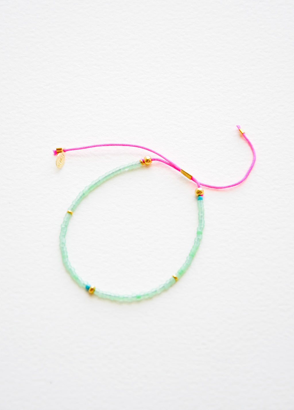 Sea Green / Neon Pink: Frosted Seed Beaded Bracelet in Sea Green / Neon Pink - LEIF