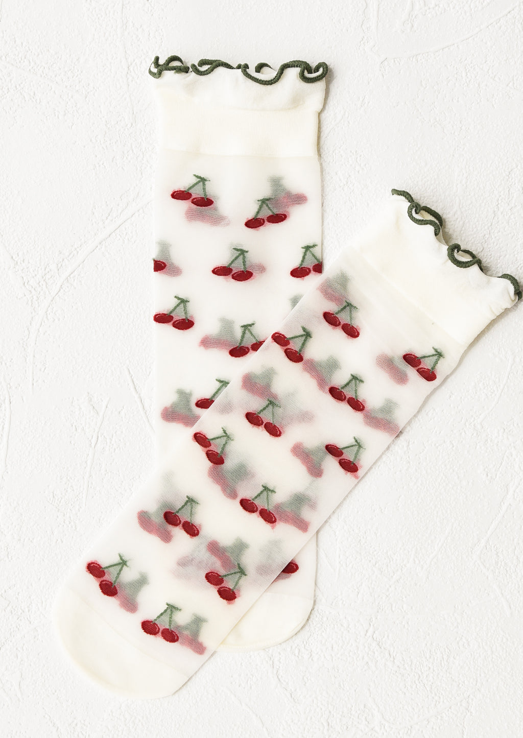 Cherry: Sheer socks with cherry print and ruffled green ankle.