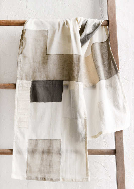 A patchwork runner in sheer patchwork design.
