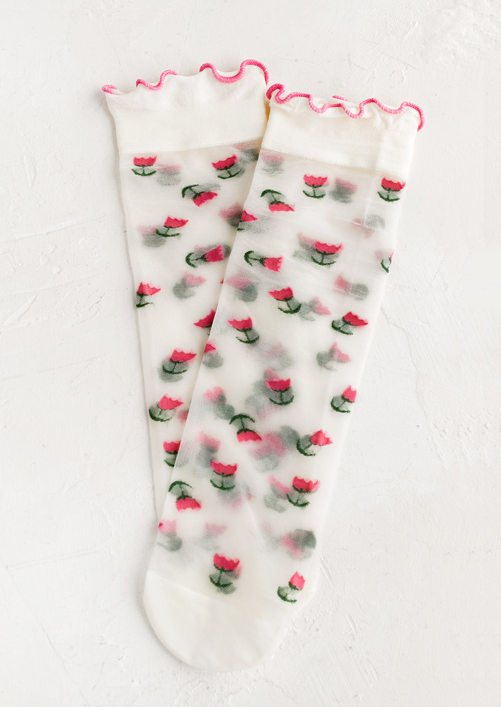 Tulip: Sheer socks with tulip print and ruffle pink ankle.