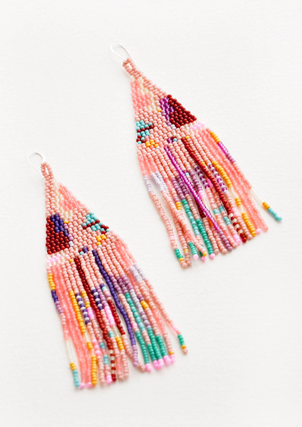 1: Pink fringe beaded earrings with irregular sections of blue, green, purple, maroon, yellow, and orange. 