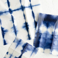 Set of 3 / Shibori: A set of three beeswax wraps with tie dye pattern in incremental sizes.