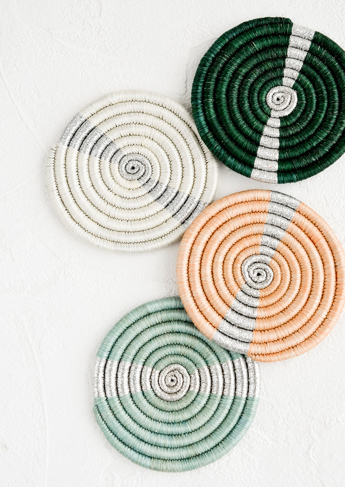 1: A set of coasters in different colors with silver streak across middle.