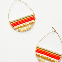 Olive / Orange Multi: Teardrop shaped hoop earrings in yellow gold with multicolored yellow and red beaded bars across. 