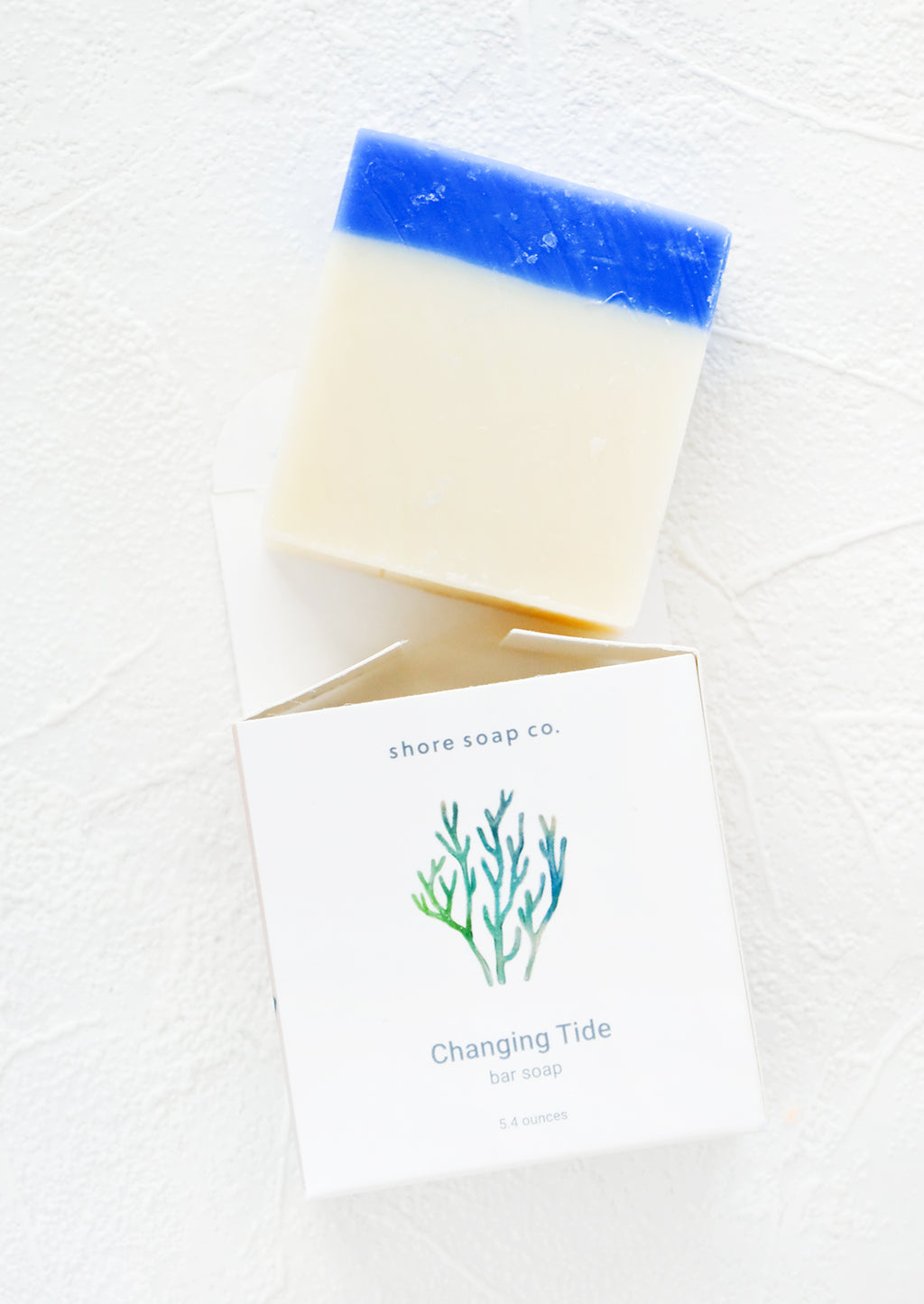 Changing Tide: Square bar soap in blue & white emerging from nautical themed packaging