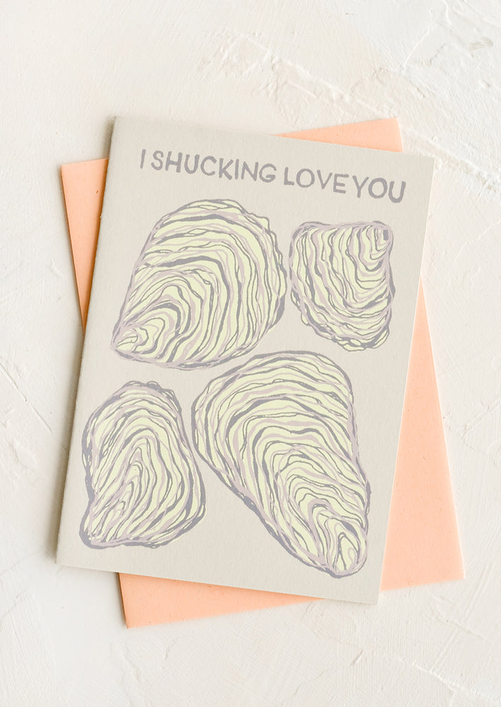 1: A greeting card with oyster print with text reading "I shucking love you".