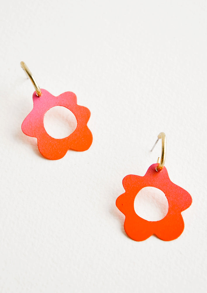 Coral Ombre: Coral flower shaped earrings with circular cutouts on small brass open hoops.