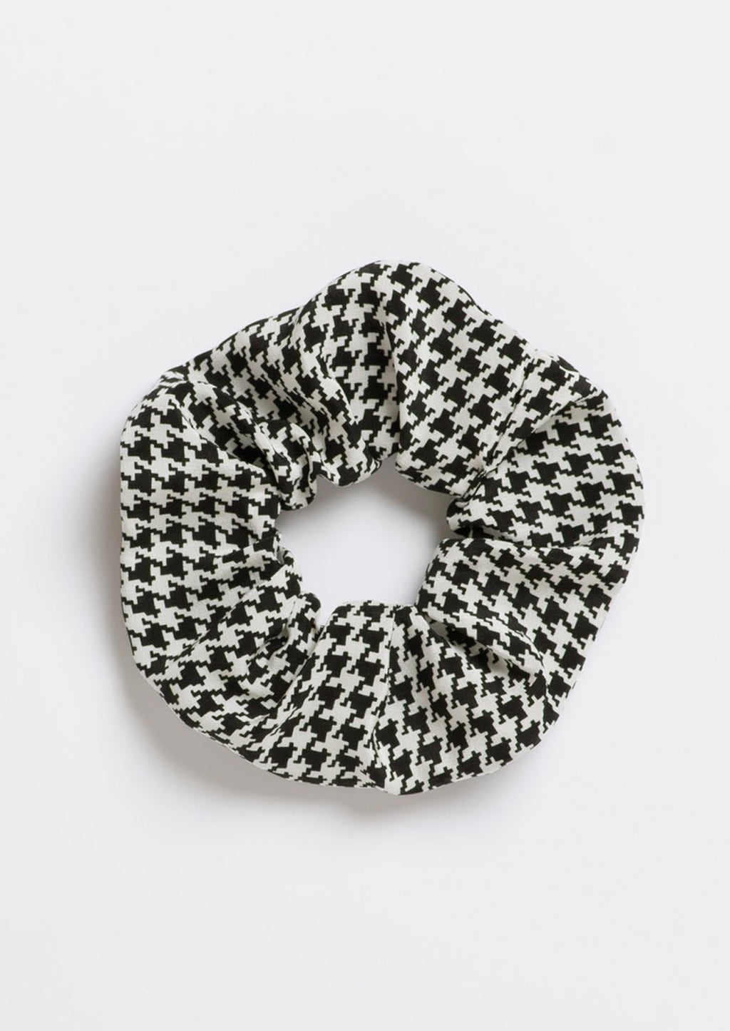 Houndstooth: A silk scrunchie in black and white houndstooth.