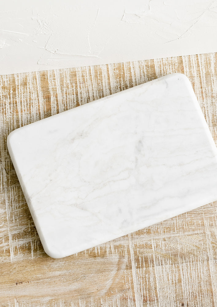 A rectangular white marble board.