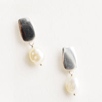 Sterling Silver: Earrings with a rectangular silver post and small pearl drop.