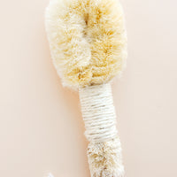 1: Wooden brush with twine wrapped handle and exfoliating head