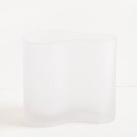 2: Frosted glass vase in curvy asymmetric shape with subtle ribbed texture