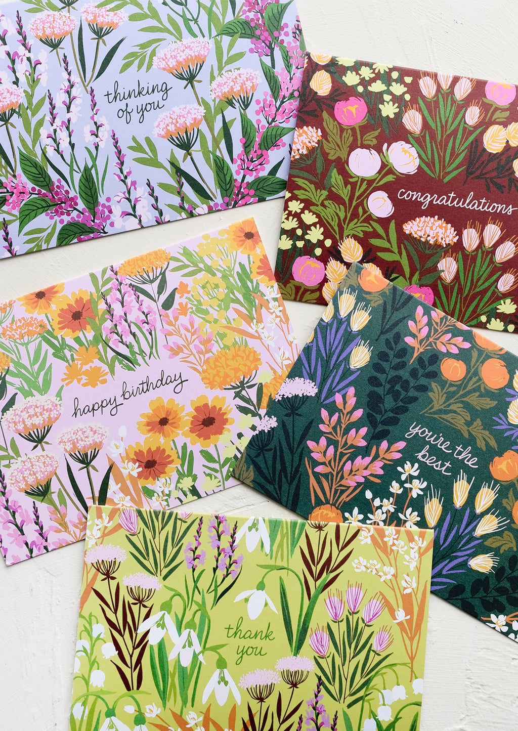 1: A set of floral printed cards for multiple occasions.