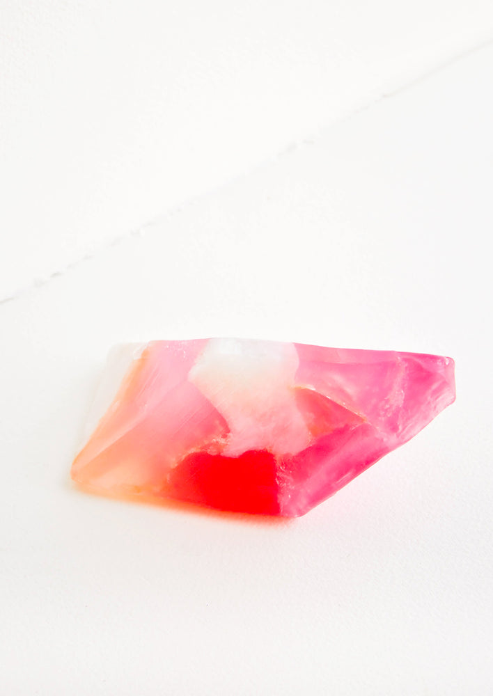 Bar soap in the form of a realistic looking rose quartz gemstone