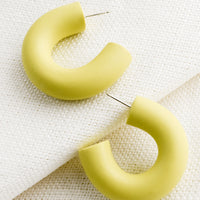 Citron: A pair of polymer clay hoop earrings in citron yellow-green.