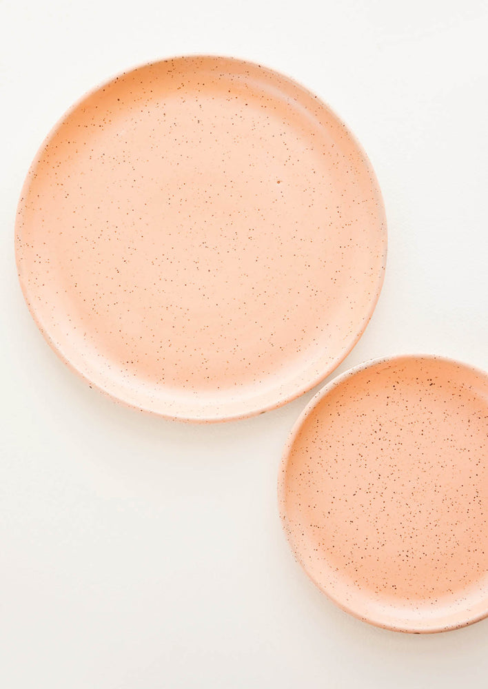 A pair of apricot Colored Speckled Ceramic Salad & Dinner Plates.