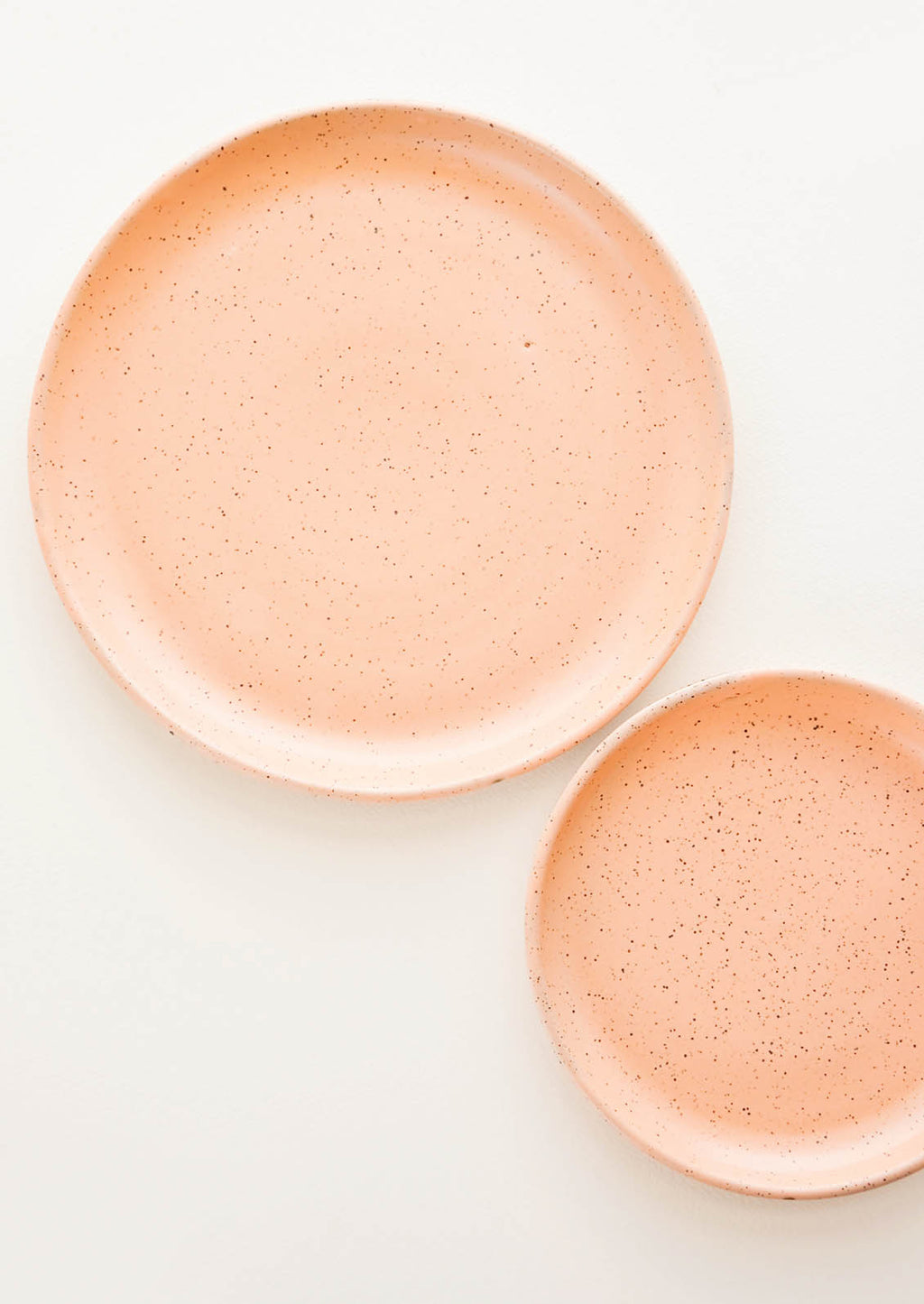 Apricot / Salad Plate: A pair of apricot Colored Speckled Ceramic Salad & Dinner Plates.