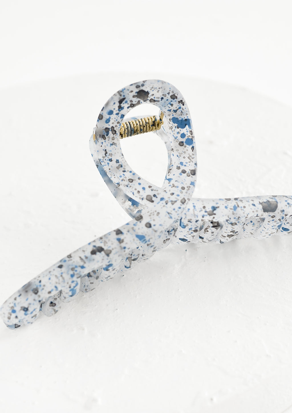 Ink Multi: A french twist hair clip in speckled ink blue.