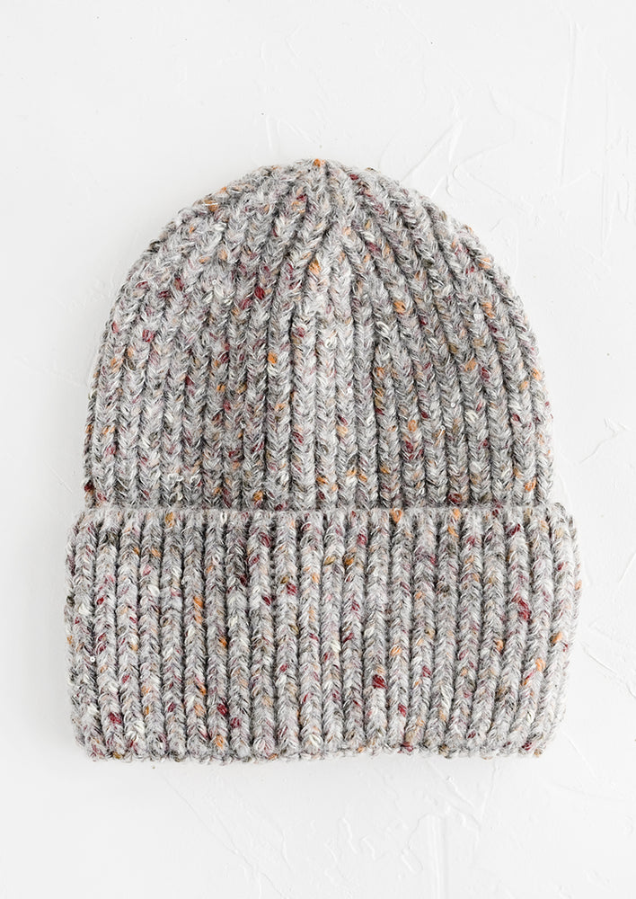 Heather Grey Multi: A knit beanie hat with cuffed rim made in speckled heather grey yarn.