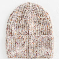 Ivory Multi: A knit beanie hat with cuffed rim made in multicolor speckled ivory yarn.