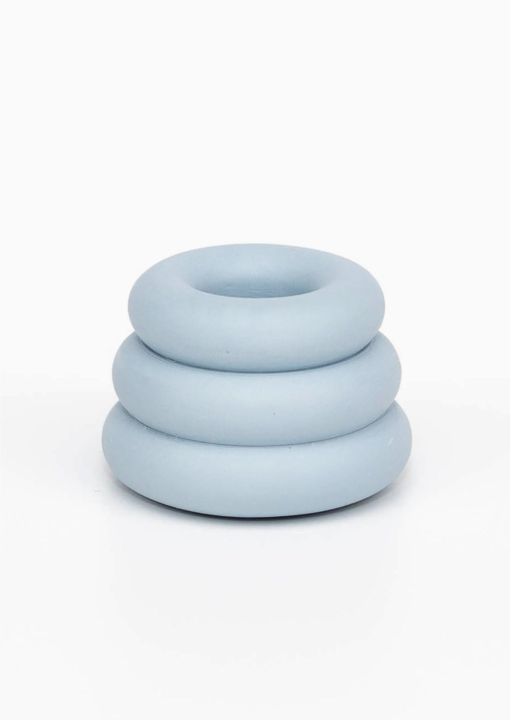 Sky Blue: A taper candle holder with 3-layer stacked donut shape in sky blue.