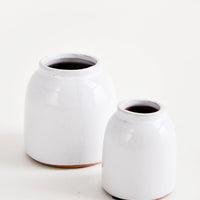 Small / White: Round, white, rustic ceramic vases in glossy finish