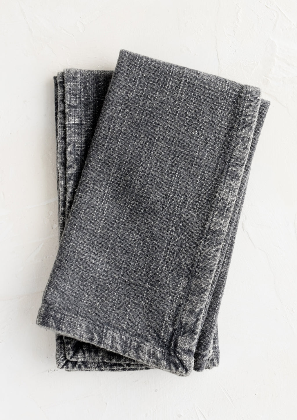 Charcoal: A pair of stonewashed napkins in mineral grey.