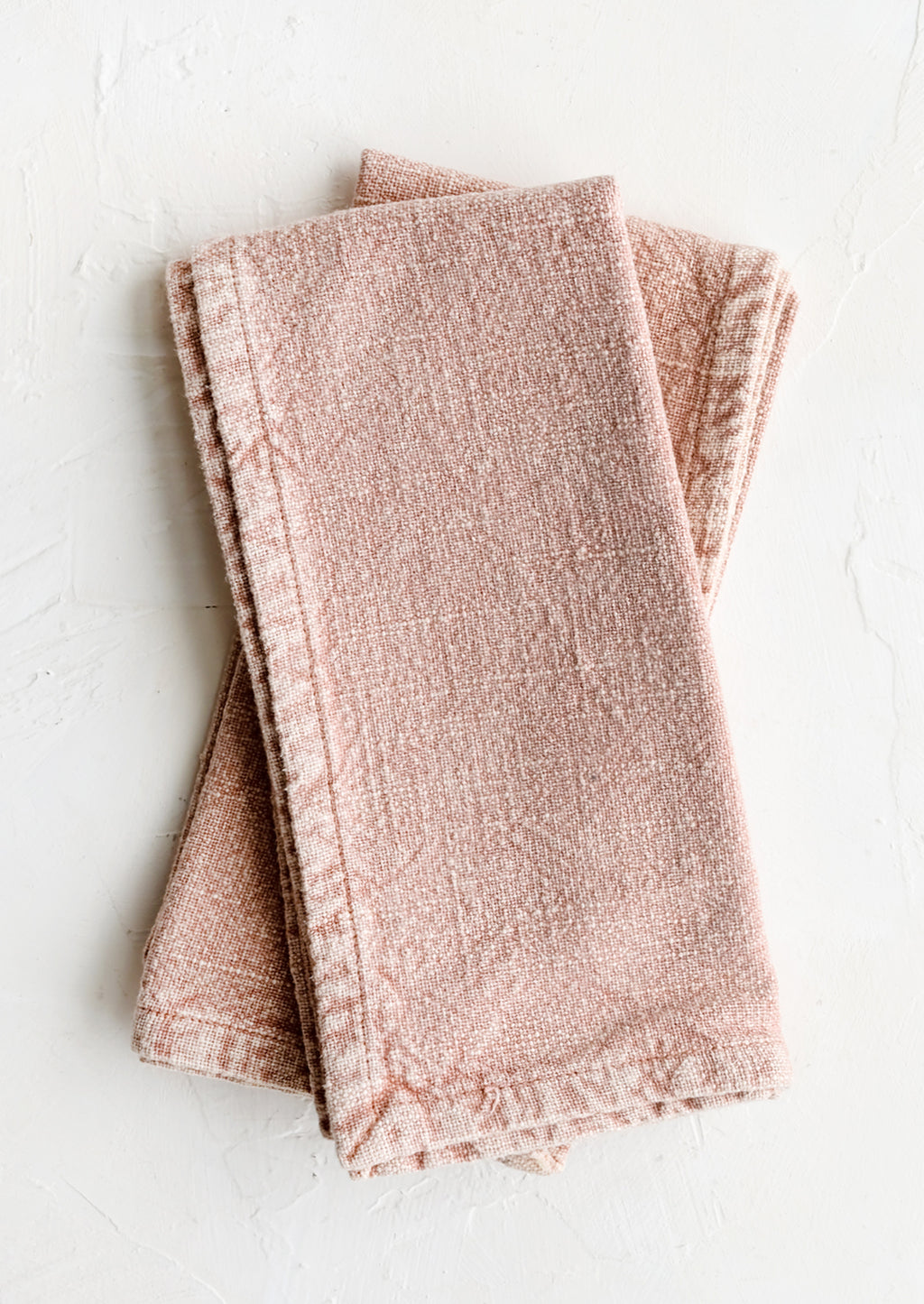 Rose: A pair of stonewashed napkins in rose pink.