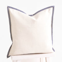 1: Square throw pillow in natural cotton canvas with striped navy & white trim around edges