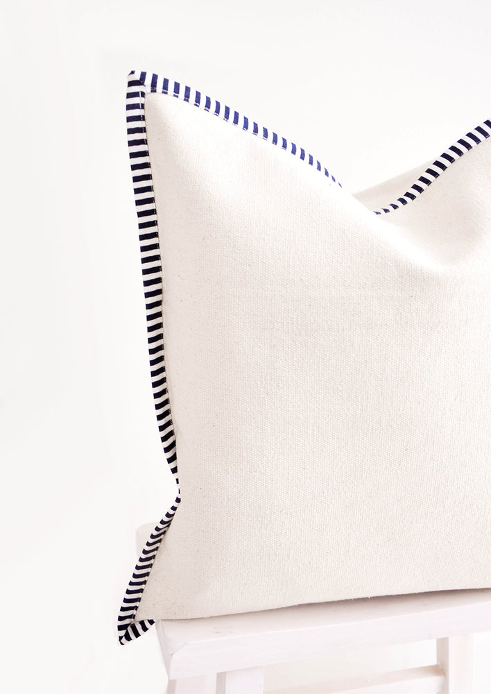 2: Detail of striped navy & white trim on cotton canvas throw pillow