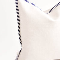 2: Detail of striped navy & white trim on cotton canvas throw pillow