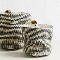 2: Small and large baskets in striped jute.