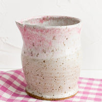 Mottled Pink: A small ceramic pitcher in mottled pink glaze.