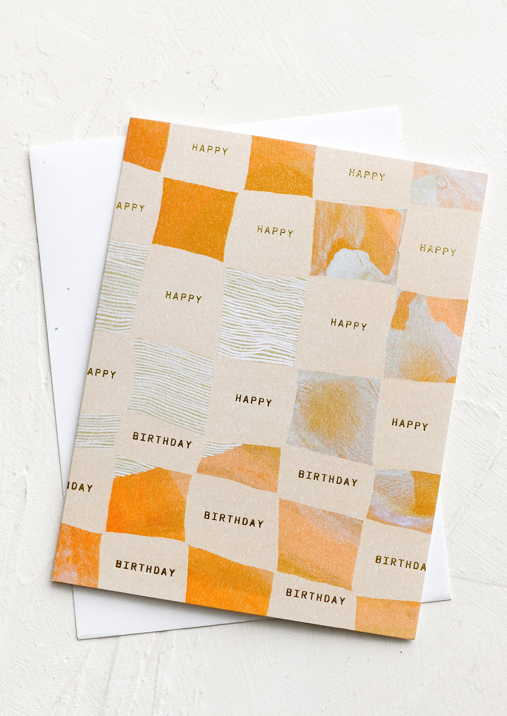 1: A birthday card with checker print.