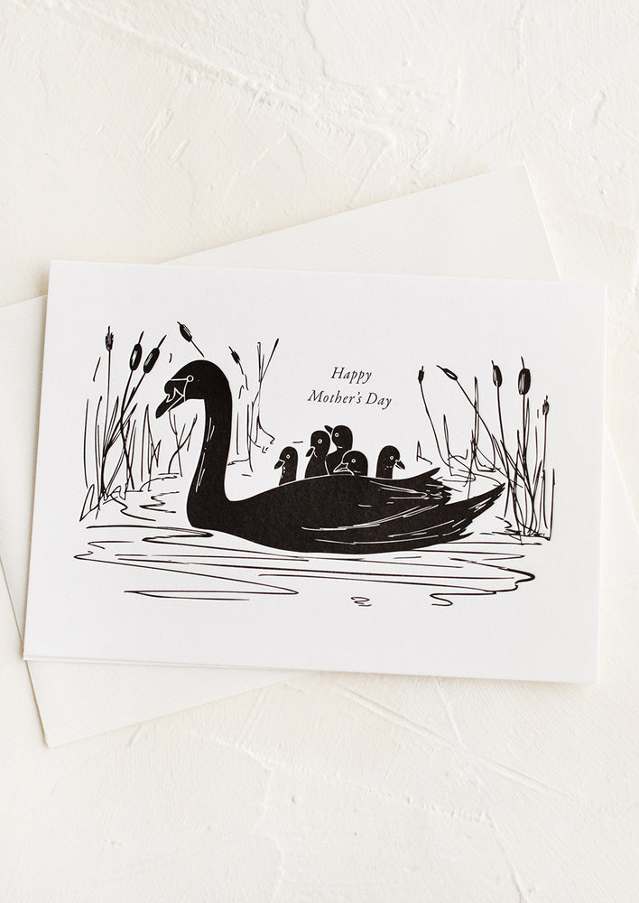 1: A mother's day greeting card with image of swan with ducklings.