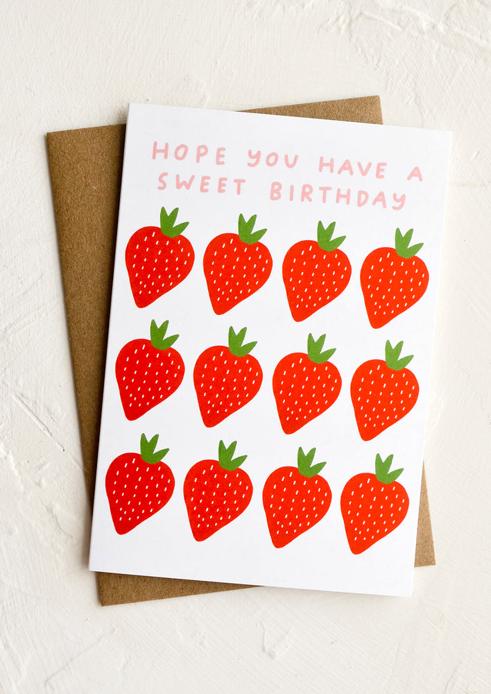 1: A birthday card with rows of strawberries, text at top reads "Hope you have a sweet birthday".