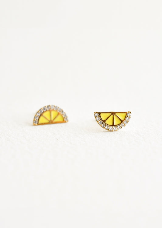 Stud earrings in the shape of a lemon wedge with crystal "rind".