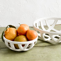 3: White ceramic fruit bowls in small and large sizes.