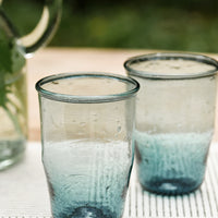 1: Two glass tumblers in tapered silhouettte.