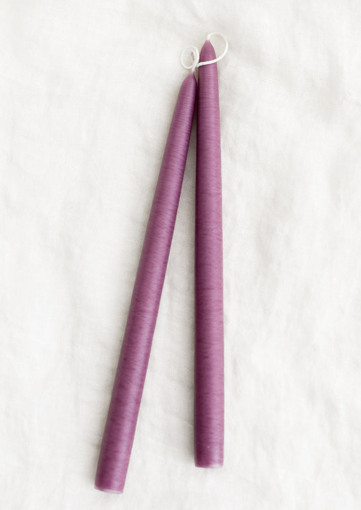 Elderberry: A pair of taper candles in elderberry purple.