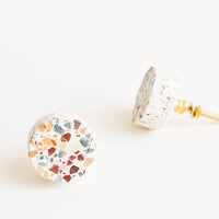 1: Round drawer knob in white stone with multicolor terrazzo pattern