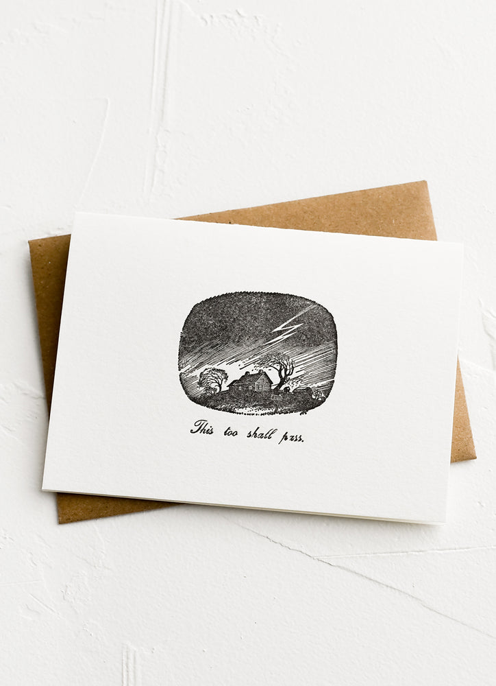 1: A greeting card with image of a storm and text below reading "This too shall pass".