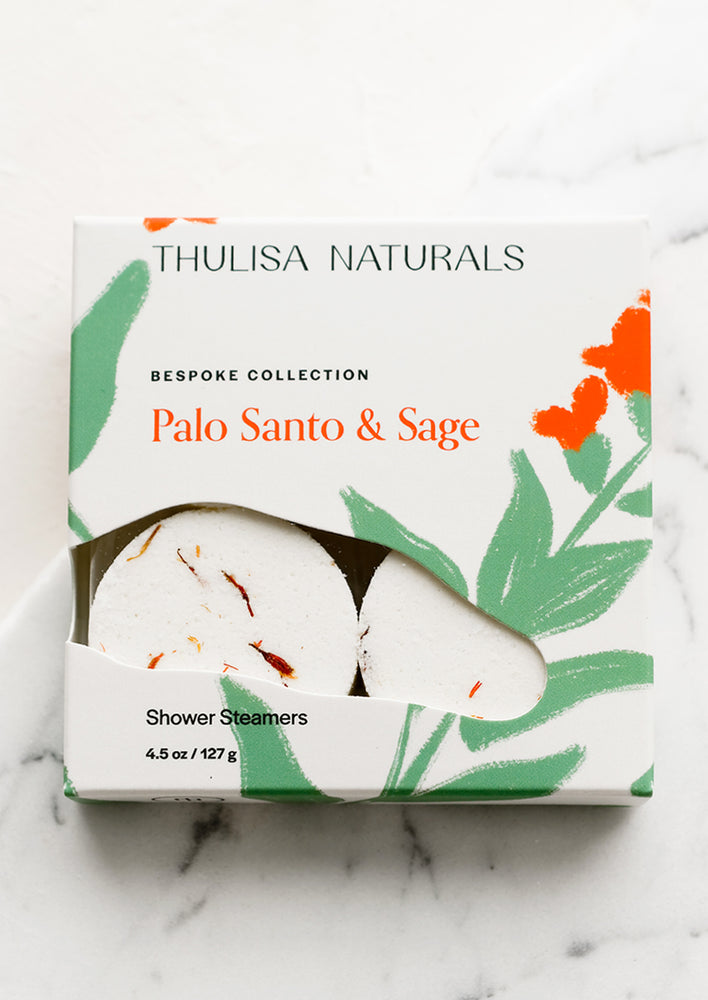 Palo Santo & Sage: A box of shower steamer tablets in palo santo & sage scent.