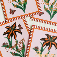 Boxed Set of 8: A tiger lily printed card set with striped border reading "Thank you so much".